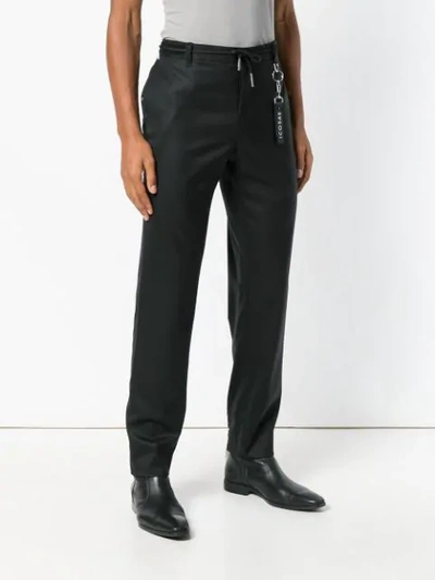 Shop Icosae Ankle Zip Tailored Trousers In Black