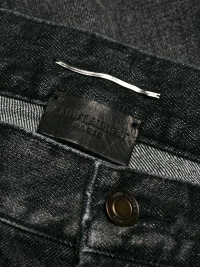 Shop Saint Laurent Faded Straight-leg Jeans In Black