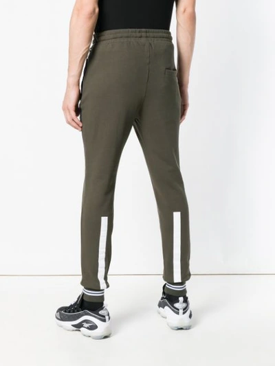 Shop Les Hommes Urban Patch Detail Track Pants In Green