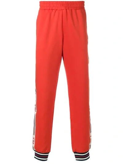 Shop Fila Side Stripe Track Pants In Orange