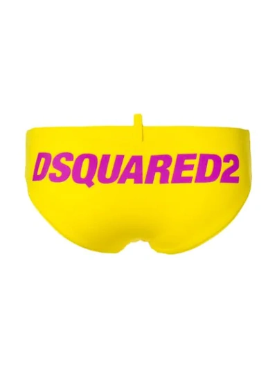 Shop Dsquared2 Logo Print Swim Slips In Yellow
