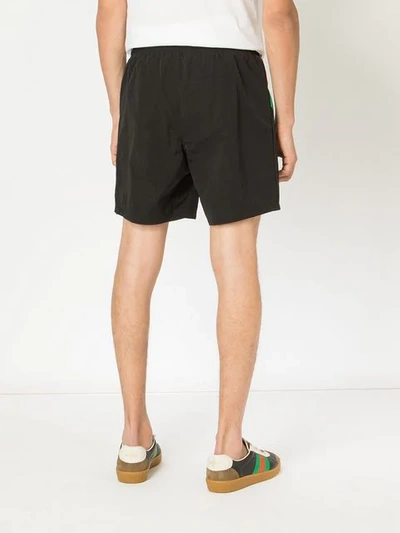 Shop Gucci Lion Head Track Shorts In Black