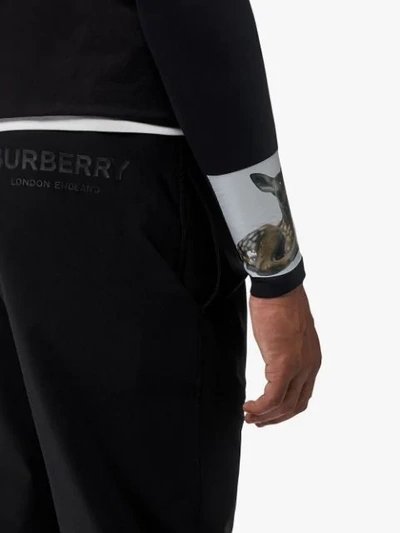Shop Burberry Logo Print Track Pants In Black