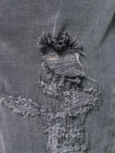 Shop Balmain Distressed 7 Pocket Skinny Jeans In Grey