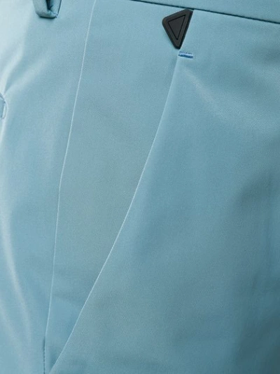 Shop Prada Cropped Techno Stretch Trousers In Blue