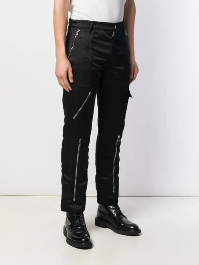 Shop Alexander Mcqueen Multiple Zips Trousers In Black