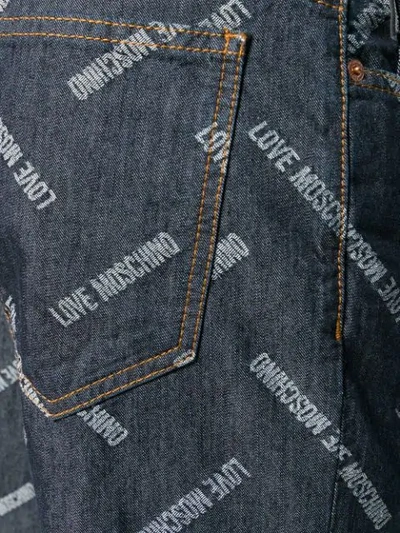 Shop Love Moschino Logo Print Jeans In Blue