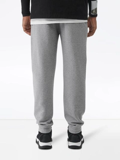 Shop Burberry Logo Print Cotton Trackpants In Grey