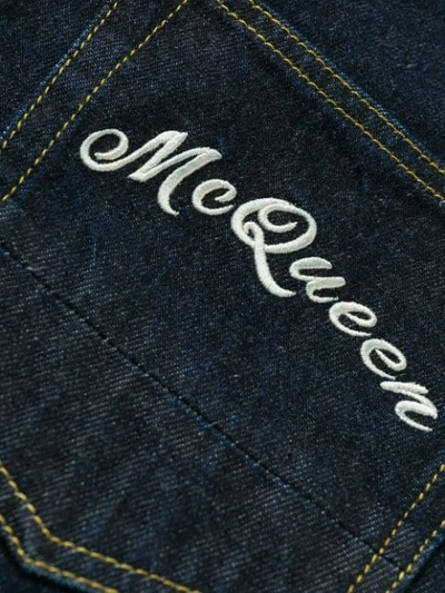 Shop Alexander Mcqueen Turned Up Hem Jeans In Blue