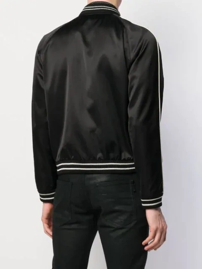 Shop Saint Laurent Trimmed Bomber Jacket In Black