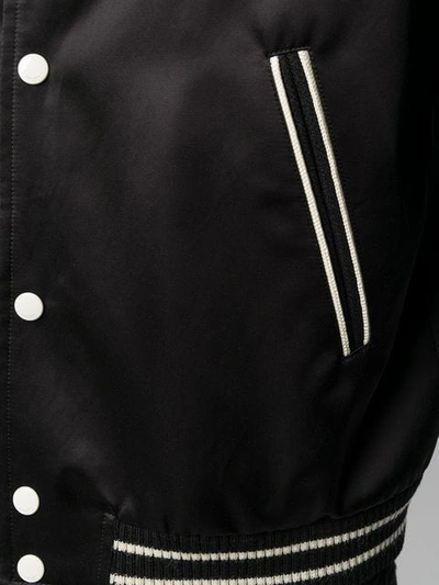 Shop Saint Laurent Trimmed Bomber Jacket In Black