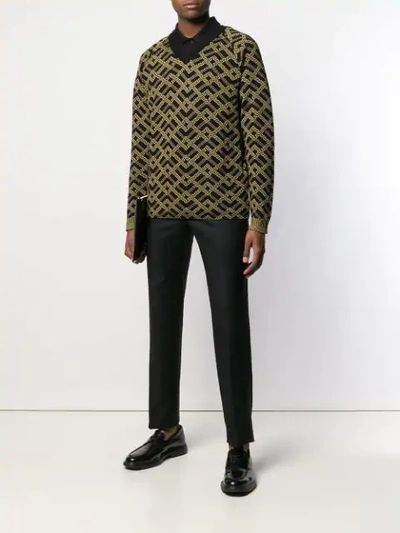 Shop Versace Printed Knit Sweater In Black
