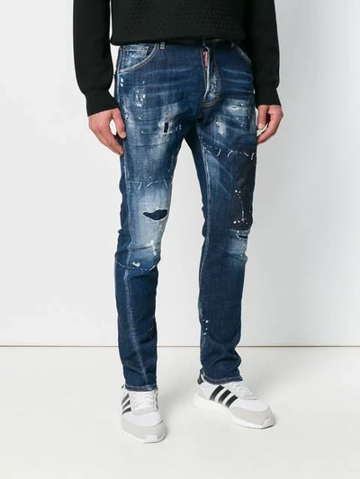Shop Dsquared2 Distressed Faded Jeans In Blue