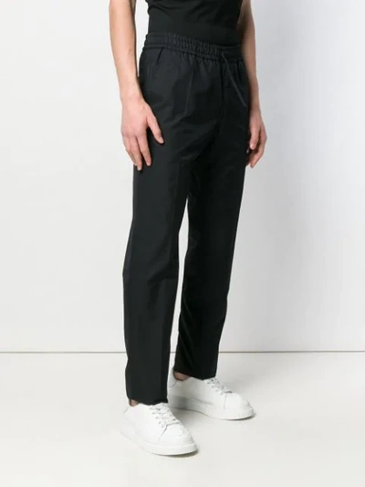 Shop Versace Straight-leg Trousers In Black