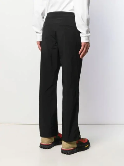 Shop Acne Studios Straight Leg Ski Trousers In 900-black