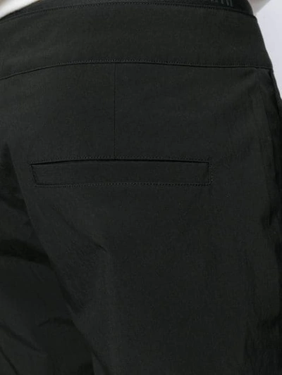Shop Acne Studios Straight Leg Ski Trousers In 900-black