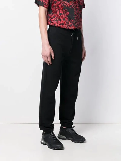 Shop Givenchy Logo Track Pants In Black