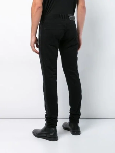 Shop Balmain Striped Leg Jeans - Black