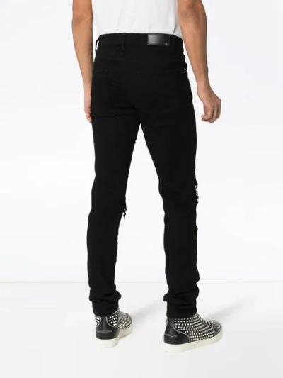 Shop Amiri Skinny-jeans Mit Bandana-einsätzen In Black