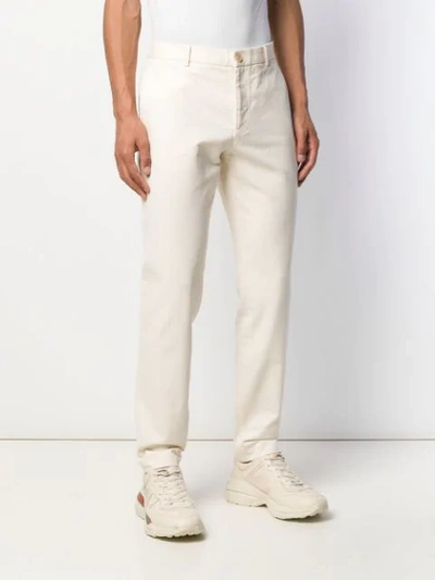Shop Gucci Rear Embroidered Straight-leg Trousers In Neutrals