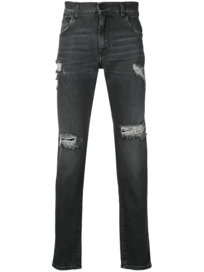 Shop Dolce & Gabbana Distressed Jeans In Black