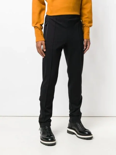 Shop Moncler Tapered Track Trousers In Black
