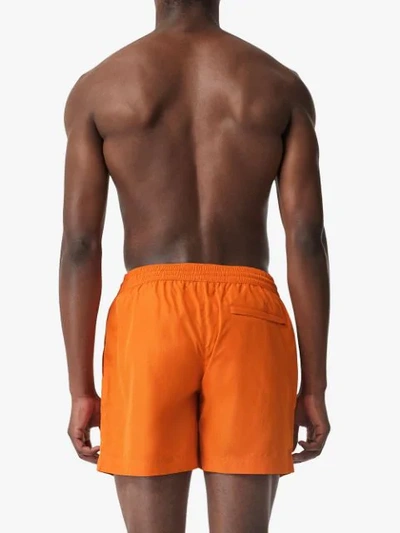 Shop Burberry Logo Detail Drawcord Swim Shorts In Orange