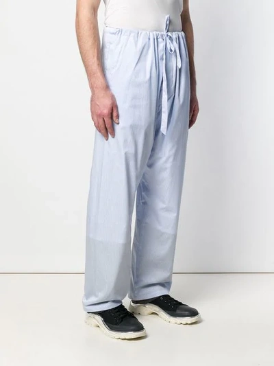 Shop Y/project Striped Loose Fit Trousers In Blue