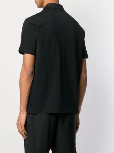Shop Versace Embroidered Polo Shirt In Black