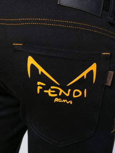 Shop Fendi Bag Bugs Slim-fit Jeans In Black