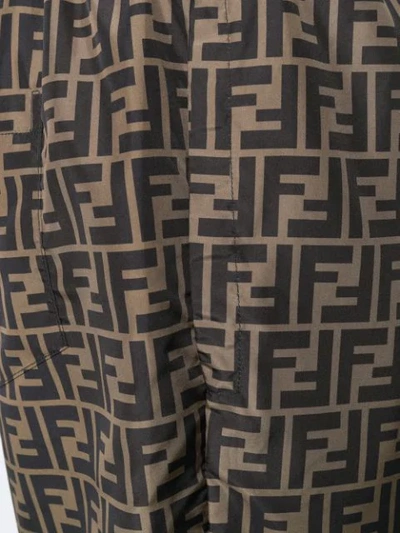 Shop Fendi Ff Print Track Pants In Brown