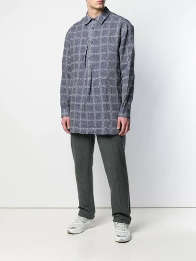 Shop Jw Anderson Logo-grid Print Tunic Shirt In Blue