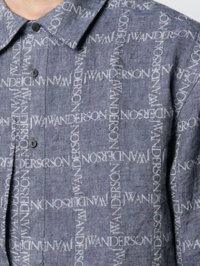 Shop Jw Anderson Logo-grid Print Tunic Shirt In Blue