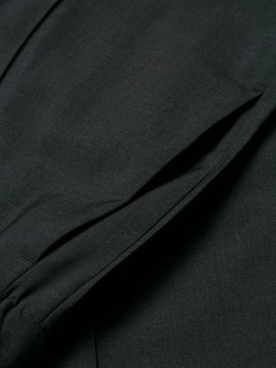 Shop Prada Travel Edition Trousers In Grey