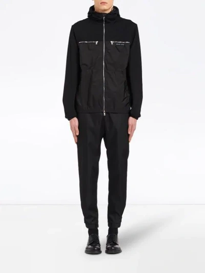 Shop Prada Hooded Logo Patch Jacket In F0806 Black/black