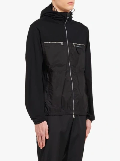 Shop Prada Hooded Logo Patch Jacket In F0806 Black/black