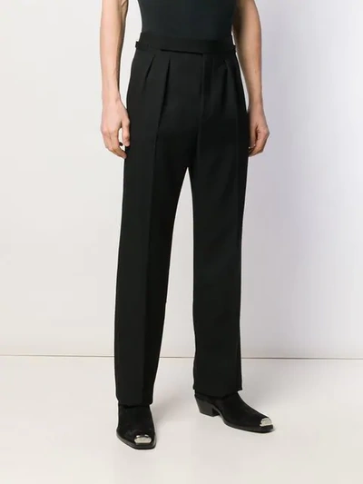 Shop Saint Laurent Pleated Tailored Trousers In Black
