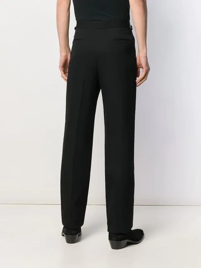 Shop Saint Laurent Pleated Tailored Trousers In Black