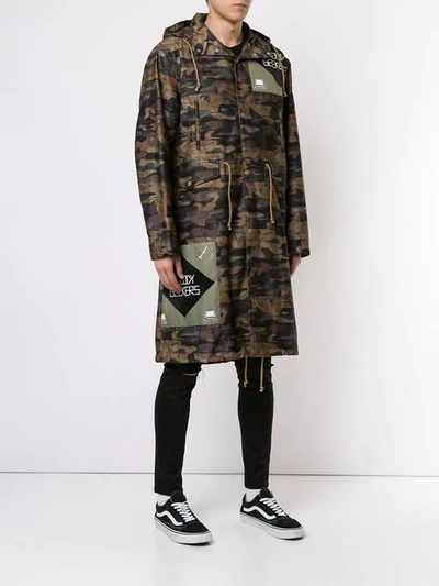 Shop Undercover 'bloody Geekers' Camouflage Raincoat In Multicolour