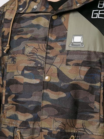 Shop Undercover 'bloody Geekers' Camouflage Raincoat In Multicolour