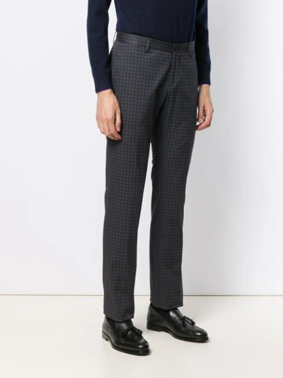 Shop Etro All-over Motif Trousers In Blue
