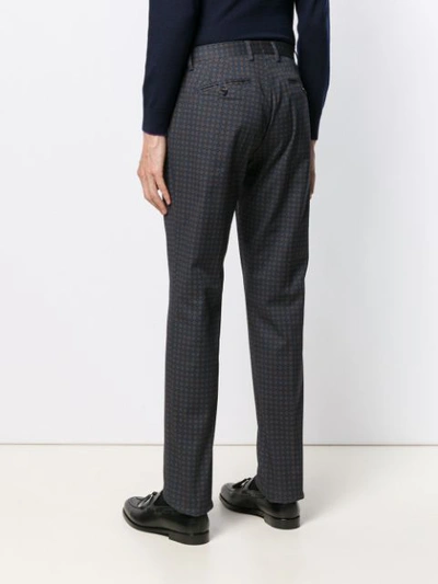 Shop Etro All-over Motif Trousers In Blue