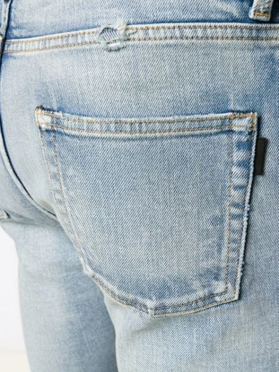 Shop Saint Laurent Distressed Straight-leg Jeans In Blue