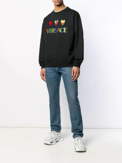 Shop Versace Hearts And Logo Embroidered Sweatshirt - Black