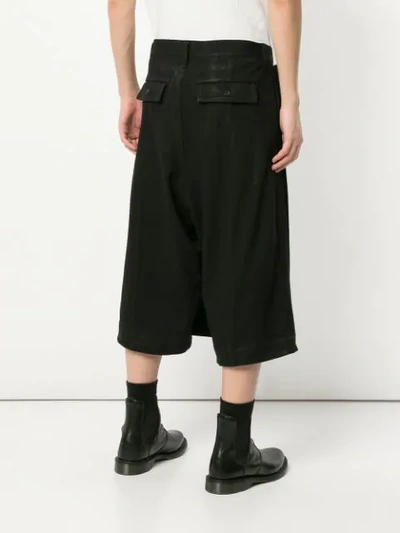 Shop Julius Drop Crotch Cropped Trousers In Black