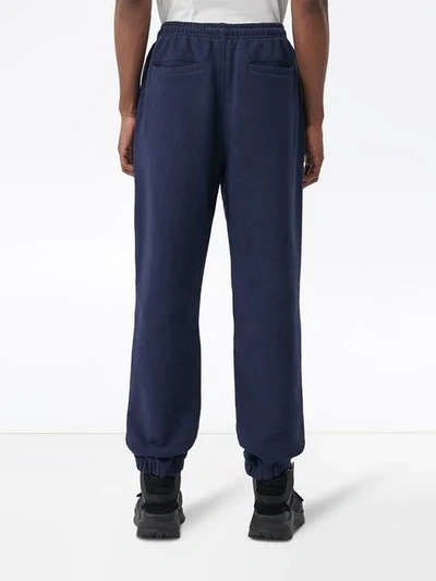 Shop Burberry Logo Track Trousers In Blue