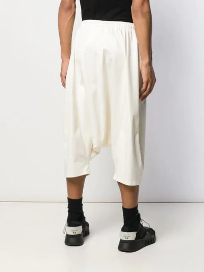 Shop Alchemy Dropped Crotch Shorts In White