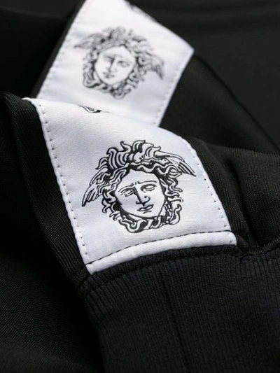 Shop Versace Medusa Strap Detail Track Jacket In Black