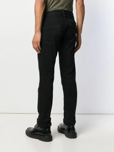 Shop Philipp Plein Distressed Straight Cut Jeans In Black
