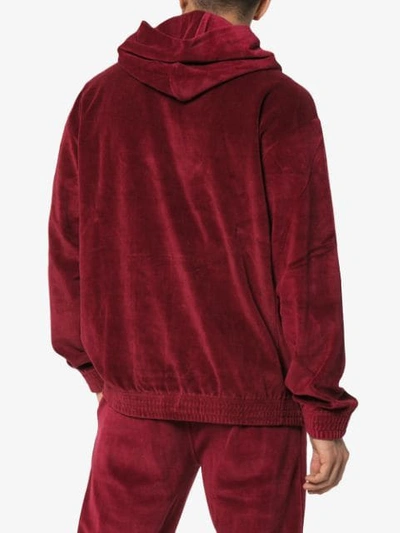 Shop Champion Reverse Weave Hooded Jumper - Red